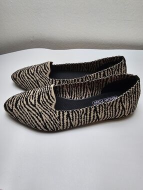 Skechers Women's Slip-On Zebra-Print Flats in Beige and Black